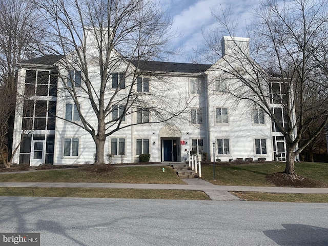 view of property with a front yard