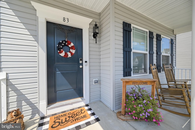 property entrance with a porch