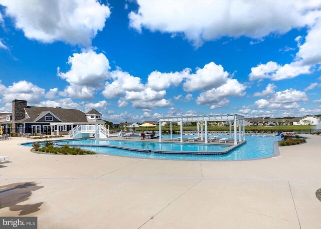32241 Ivory Gull Way, Millsboro, DE 19966 - community pool featuring a pergola and a patio area