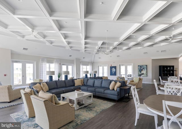 32241 Ivory Gull Way, Millsboro, DE 19966 - living room with coffered ceiling, french doors, plenty of natural light, wood finished floors, and beamed ceiling