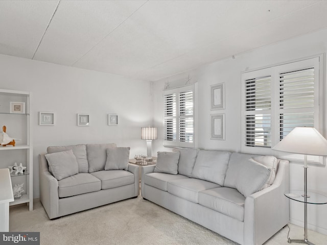 living room with light colored carpet