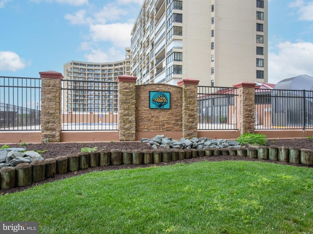 exterior space featuring a yard and fence