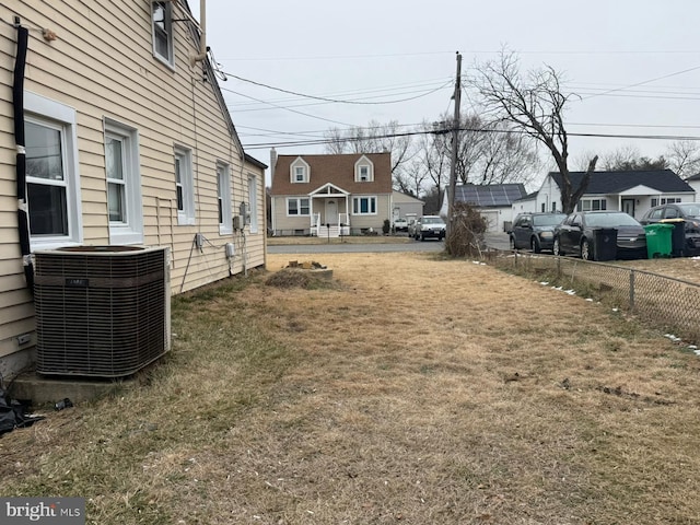 view of yard with central AC