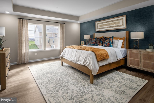 bedroom featuring hardwood / wood-style floors