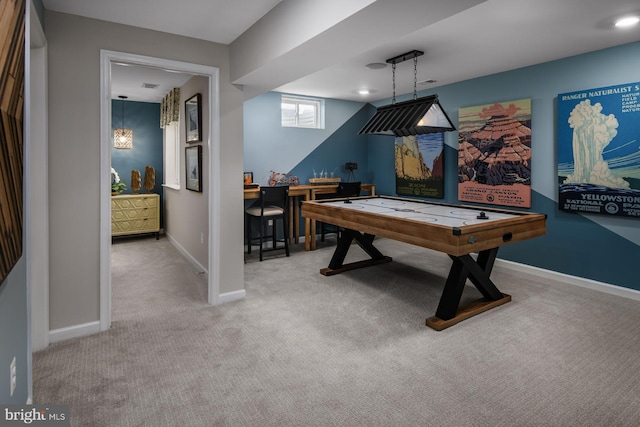 recreation room featuring light colored carpet