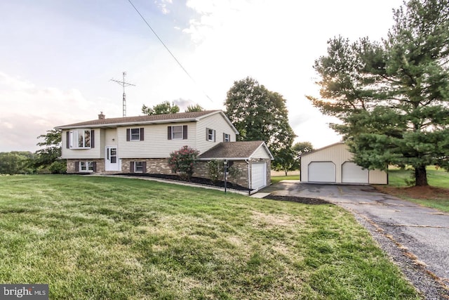 raised ranch featuring a garage, a front yard, and a chimney