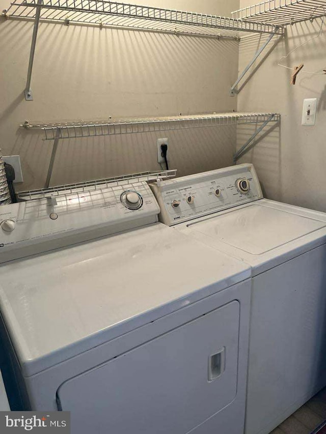 laundry area featuring separate washer and dryer