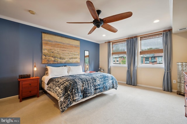 bedroom featuring carpet, crown molding, baseboards, and recessed lighting