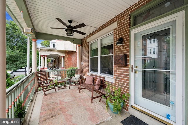 view of patio with a porch and a ceiling fan