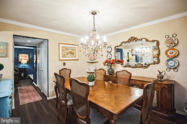 dining room with ornamental molding and dark hardwood / wood-style floors