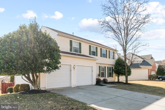 view of front facade with a garage, concrete driveway, and fence