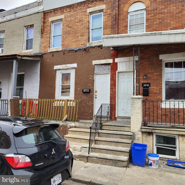 view of front of property with brick siding