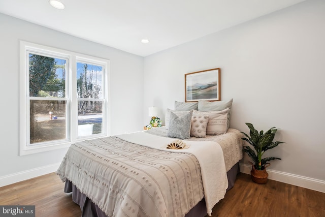 bedroom featuring wood-type flooring