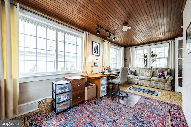 home office featuring wooden ceiling and track lighting