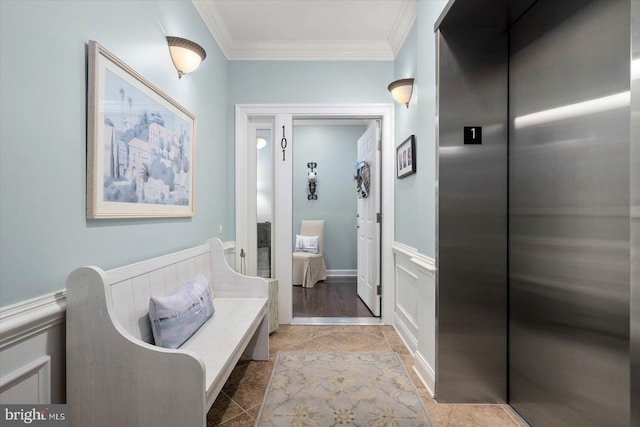 bathroom featuring ornamental molding and elevator