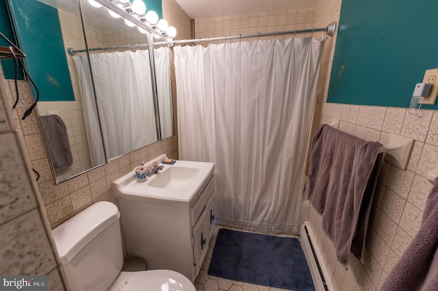 full bathroom featuring toilet, a baseboard heating unit, vanity, tile walls, and shower / bath combo