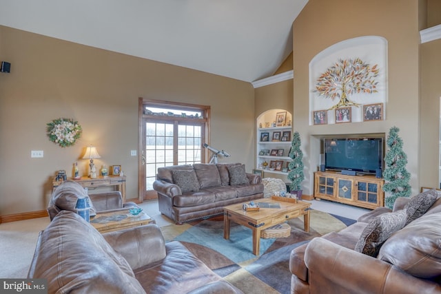 living room featuring high vaulted ceiling, built in shelves, and light carpet