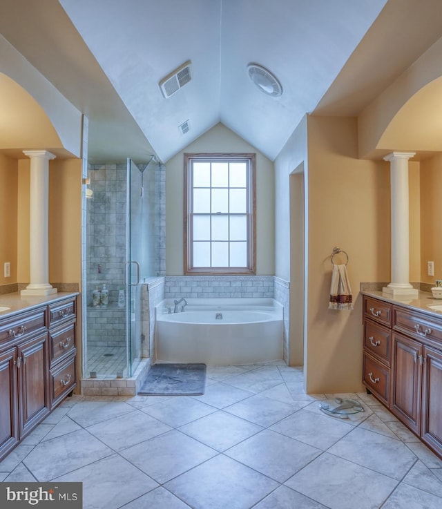 bathroom featuring separate shower and tub, vanity, and ornate columns