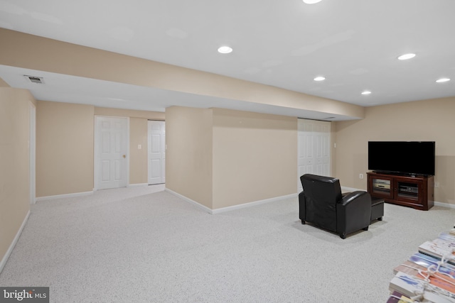 interior space featuring visible vents, baseboards, light colored carpet, and recessed lighting