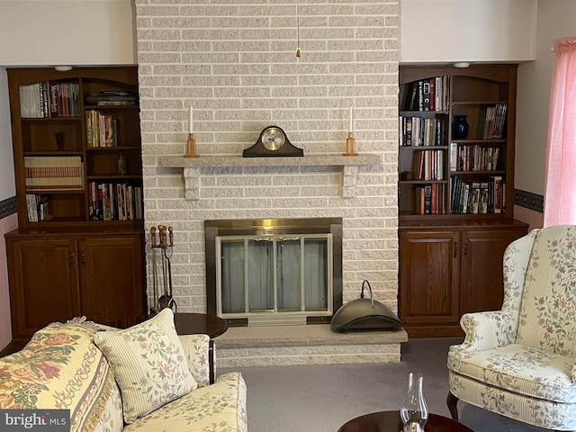 living area featuring carpet floors and a fireplace