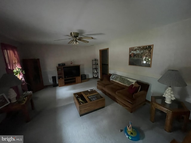 living room featuring a ceiling fan