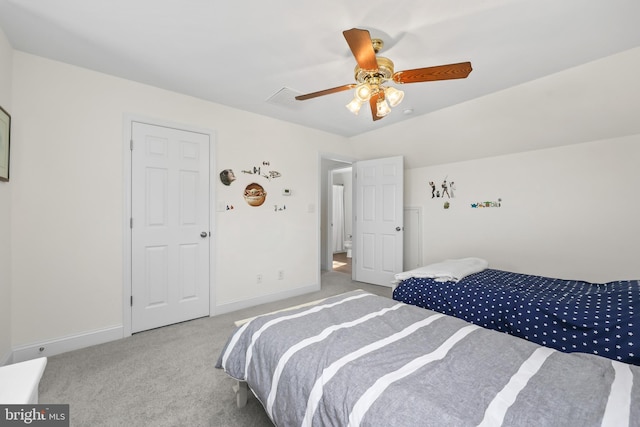 bedroom featuring ceiling fan and carpet floors