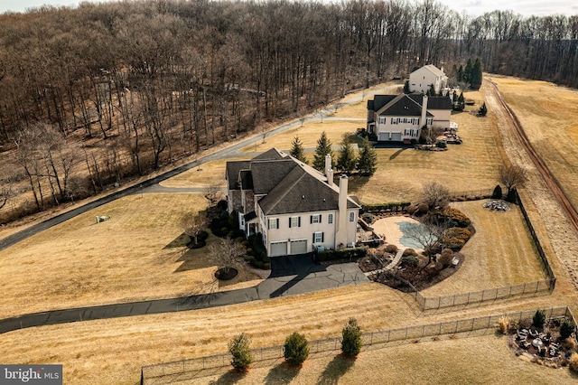 birds eye view of property featuring a rural view