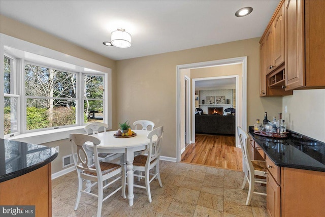 dining room featuring baseboards