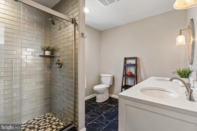 full bathroom featuring toilet, a sink, visible vents, marble finish floor, and a shower stall