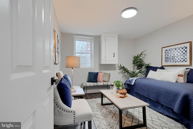 bedroom with light wood-style floors