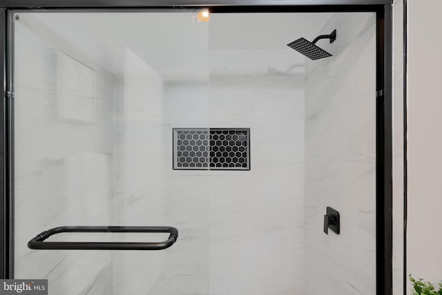 bathroom with a stall shower