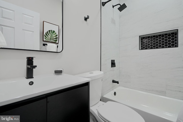 bathroom featuring toilet,  shower combination, and vanity