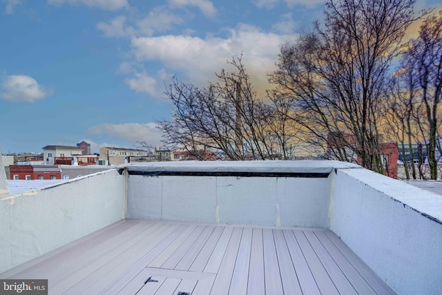 view of snow covered deck