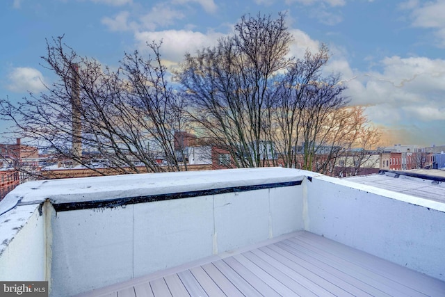 view of snow covered deck