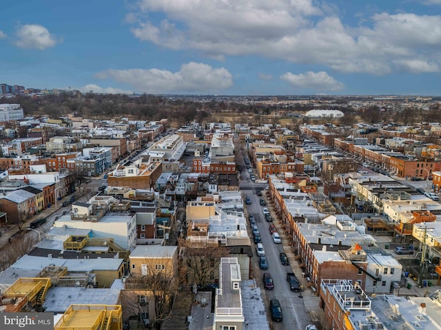 birds eye view of property with a view of city