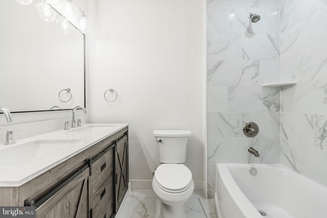 full bathroom featuring toilet, vanity, and tiled shower / bath