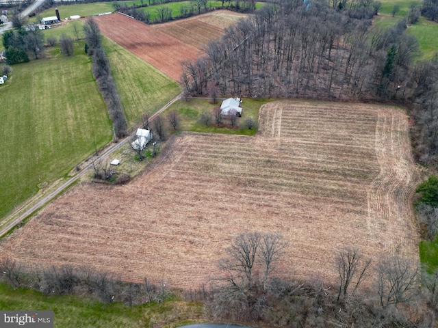 birds eye view of property featuring a rural view