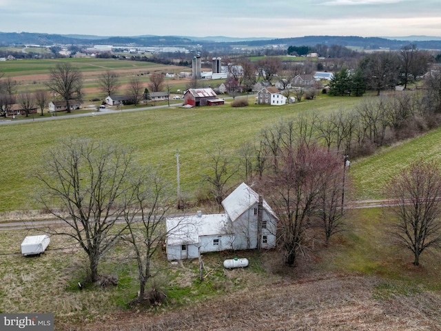 drone / aerial view with a rural view and a mountain view