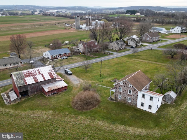 birds eye view of property featuring a rural view