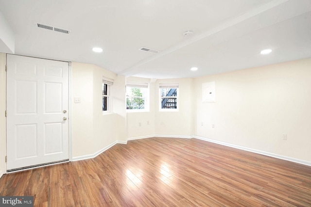 interior space with hardwood / wood-style flooring