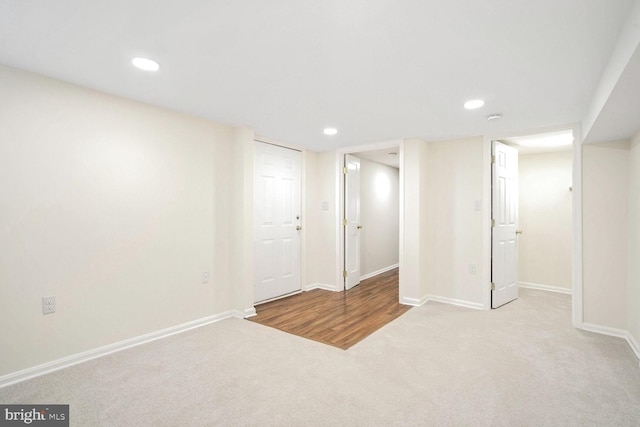 basement with light colored carpet