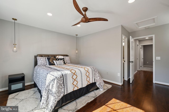 bedroom featuring attic access, baseboards, a ceiling fan, dark wood-style flooring, and recessed lighting