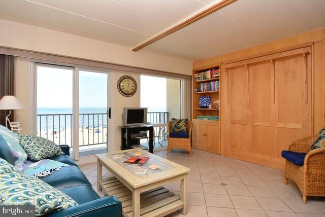 living area featuring light tile patterned floors