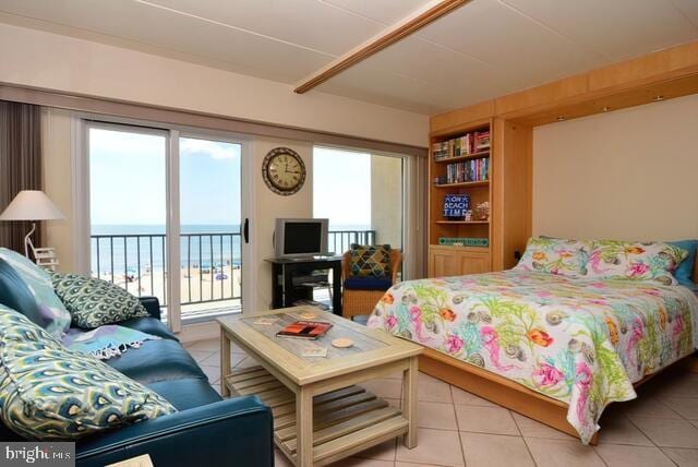 bedroom with access to outside, multiple windows, and light tile patterned flooring