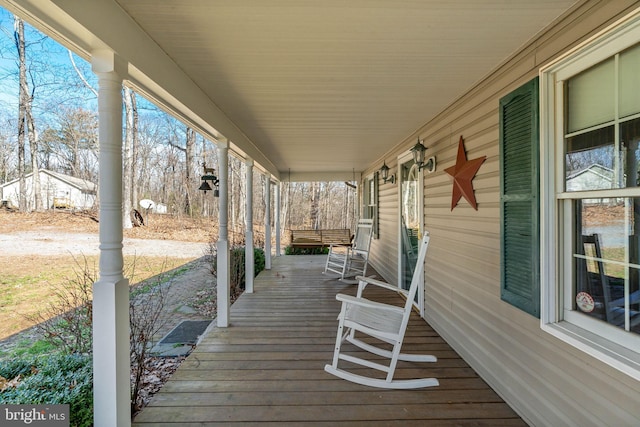 wooden terrace with covered porch