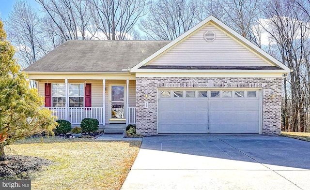 view of front of home featuring covered porch and a garage