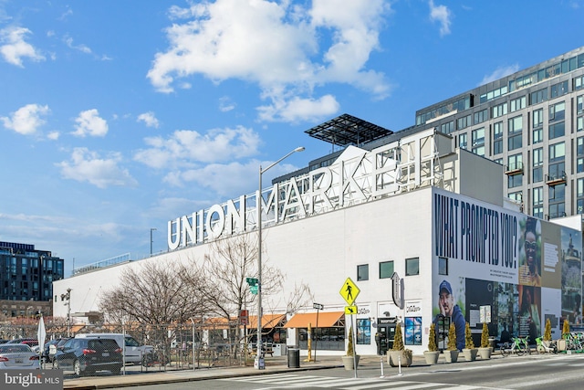 view of building exterior featuring a view of city