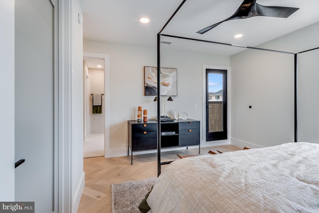 bedroom with ensuite bath, baseboards, visible vents, and recessed lighting