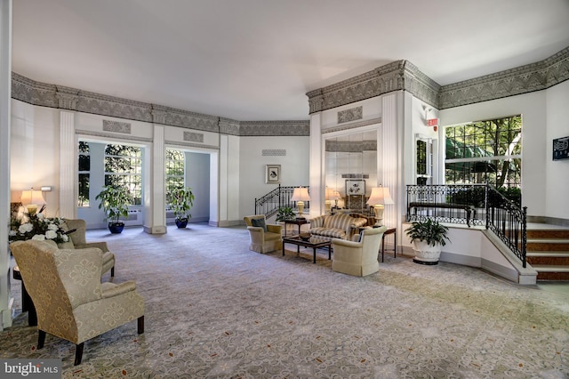 interior space featuring stairs and baseboards