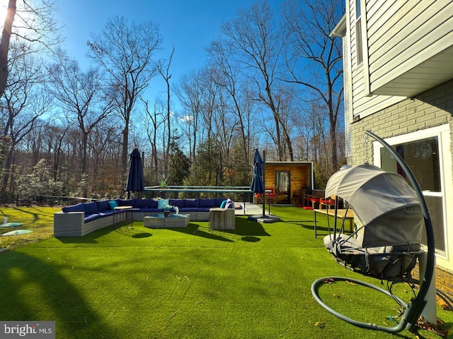 view of yard with an outdoor living space